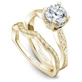 A Noam Carver yellow gold engagement ring with 12 diamonds.