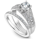 A Noam Carver white gold engagement ring with 54 diamonds on a band.