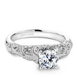 A Noam Carver white gold engagement ring with milgrain detailing and 44 round diamonds on a band.