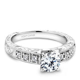 A Noam Carver engraved white gold engagement ring with 6 round diamonds on a band.