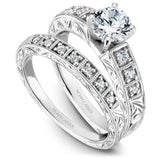 A Noam Carver engraved white gold engagement ring with 6 round diamonds on a band.