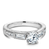 A Noam Carver engraved white gold engagement ring with 2 baguette and 8 round diamonds on a band.