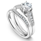A Noam Carver white gold engagement ring with milgrain detailing and 28 round diamonds on a band.
