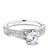 A Noam Carver white gold engagement ring with a round centerpiece and 46 round diamonds on a band.