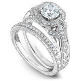 A Noam Carver engraved white gold engagement ring with a cushion halo and 44 diamonds.