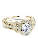 A Noam Carver engraved yellow gold engagement ring with a cushion halo and 44 diamonds.