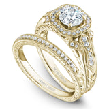 A Noam Carver engraved yellow gold engagement ring with a cushion halo and 44 diamonds.