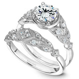 A Noam Carver white gold engagement ring with 10 diamonds.