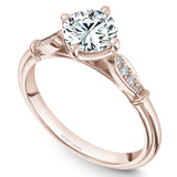 A Noam Carver rose gold engagement ring with 8 diamonds.