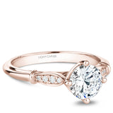 A Noam Carver rose gold engagement ring with 8 diamonds.