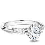 A Noam Carver white gold engagement ring with 8 diamonds.