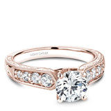 A Noam Carver rose gold engagement ring with 8 diamonds.
