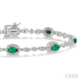 5x3 MM Oval Cut Emerald and 1/20 Ctw Single Cut Diamond Bracelet in 14K White Gold