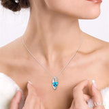 8x8 MM Trillion Cut Blue Topaz and 1/20 Ctw Round Cut Diamond Pendant in 10K White Gold with Chain