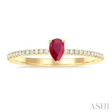 1/10 ctw Petite 5x3 MM Pear Cut Ruby and Round Cut Diamond Precious Fashion Ring in 10K Yellow Gold