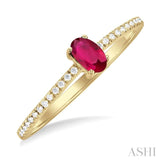 1/10 ctw Petite 5x3 MM Oval Cut Ruby and Round Cut Diamond Precious Fashion Ring in 10K Yellow Gold