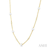 1/8 Ctw 3 MM Cultured Pearl and Round Cut Diamond Station Necklace in 14K Yellow Gold