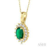 6x4 MM Oval Cut Emerald Center Sunflower and 1/8 Ctw Round Cut Diamond Precious Pendant in 10K Yellow Gold with chain