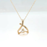 14K Yellow Gold Rice Pearl Pendant with Diamond Accent