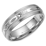 A white gold wedding band with a patterned  center.