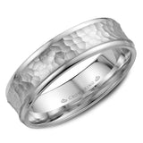 A white gold wedding band with a hammered center.