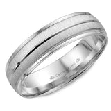 A textured white gold wedding band with line and milgrain detailing.