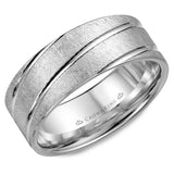A white gold wedding band with a diamond brushed finish and diagonal line detailing.
