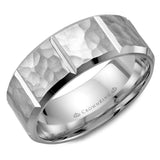A white gold wedding band with a hammered finish and notch detailing.