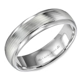 A white gold wedding band with a textured center and polished edges.