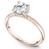 A Noam Carver rose gold engagement ring with 16 diamonds.