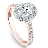 A Noam Carver rose gold engagement ring with 38 diamonds, an oval centerpiece and a white gold halo.