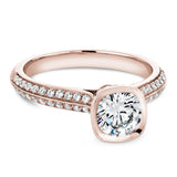 A Noam Carver rose gold engagement ring with milgrain detailing and 66 diamonds.