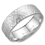 A wedding band with a hammered finish and rope detailing.