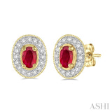 5x3mm Oval Cut Ruby and 1/4 Ctw Round Cut Diamond Earrings in 14K Yellow Gold
