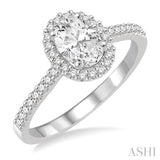 5/8 Ctw Diamond Engagement Ring with 1/3 Ct Oval Shaped Center stone in 14K White Gold