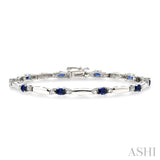 1/10 Ctw Bar and Oval Mount Round Cut Diamond & 5x3MM Oval Cut Sapphire Precious Bracelet in 10K White Gold