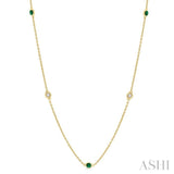 1/6 ctw Round Cut Diamond and 1.75MM Emerald Precious Station Necklace in 14K Yellow Gold